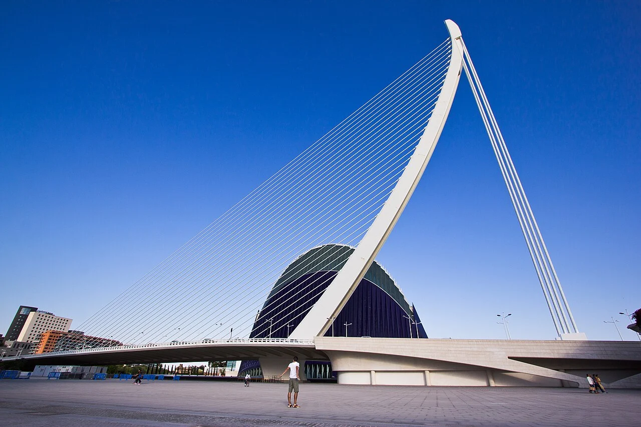 Assut de l’Or Bridge in Valencia, Spain, with its white pylon and cable stays against a blue sky